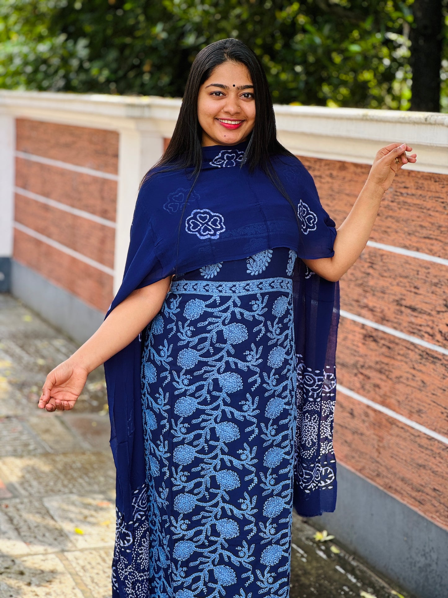 Unstitched three-piece set with intricate Chikankari threadwork on premium georgette fabric. - A1431