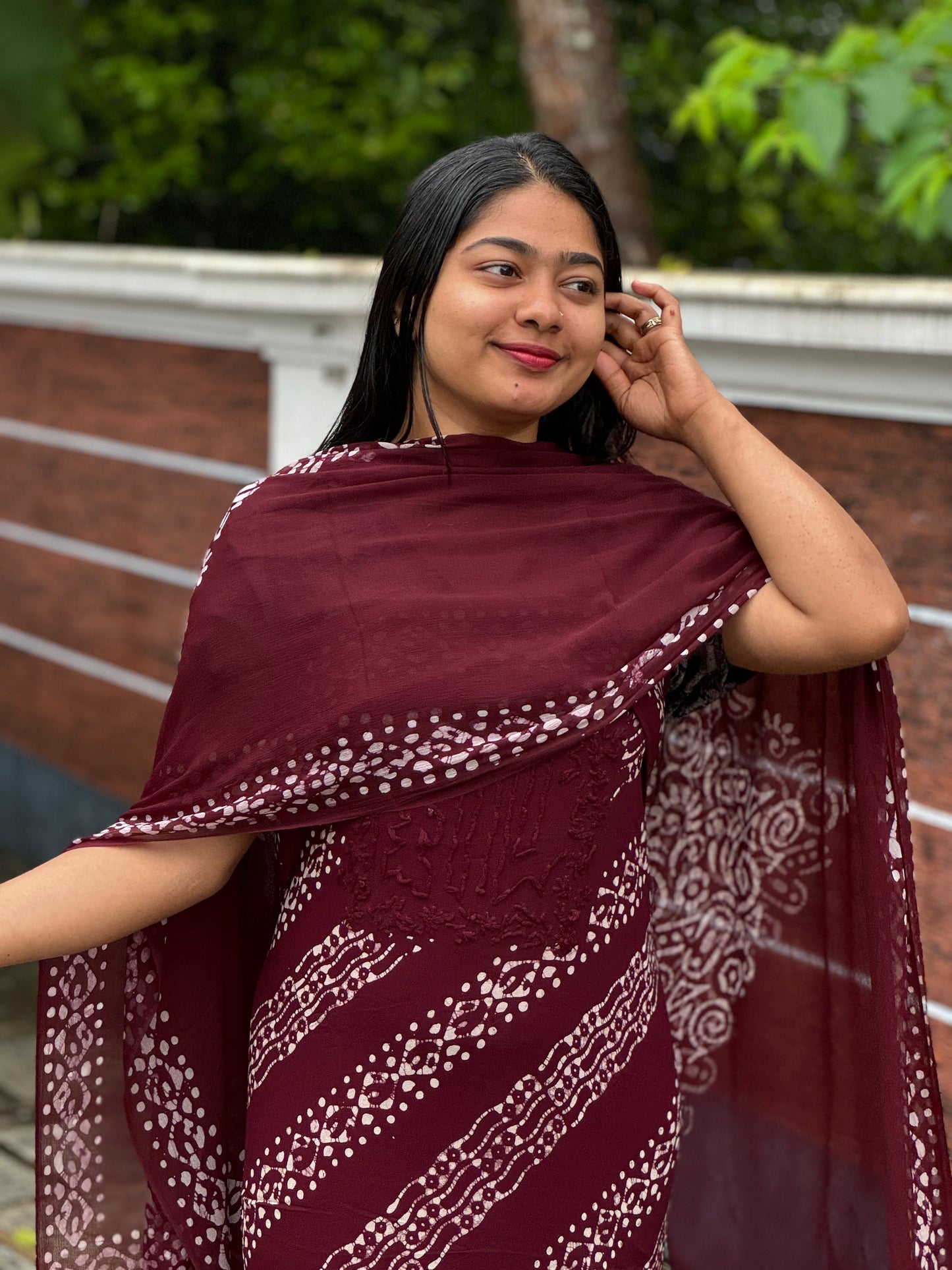 Unstitched three-piece set with intricate Chikankari threadwork on premium georgette fabric. - A1450