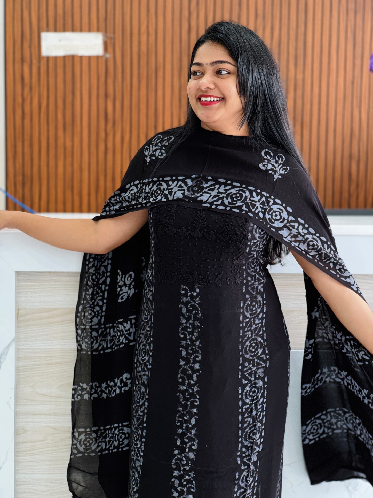 Unstitched three-piece set with intricate Chikankari threadwork on premium georgette fabric. A1770