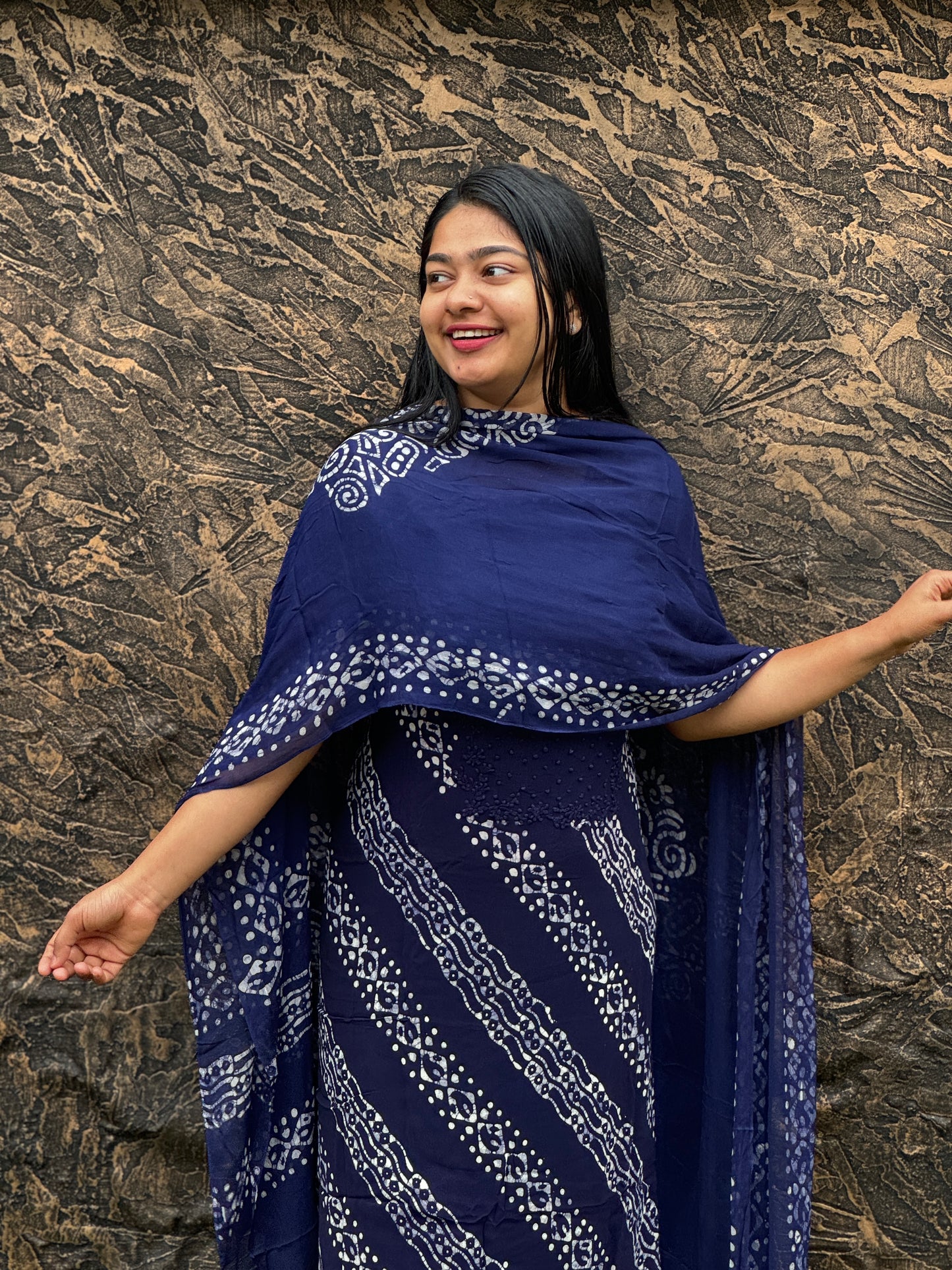 Unstitched three-piece set with intricate Chikankari threadwork on premium georgette fabric. - A1450